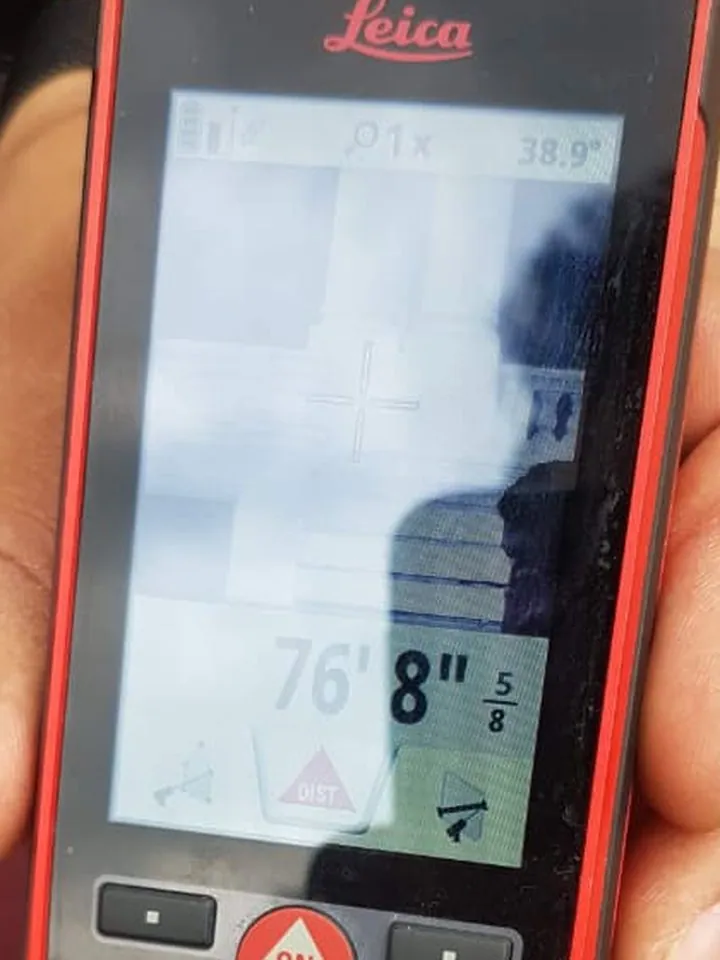 Leica DISTO S910 display reading 76 feet 8 5/8 inches at an angle of 38.9 degrees.